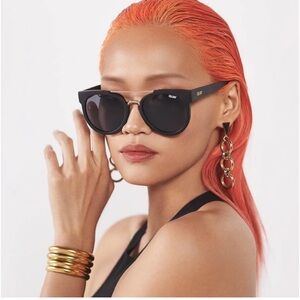 Quay Odin Sunglasses. Matte black frame with smoke lenses.